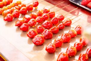 Candied fruit skewers with strawberries in Shanghai